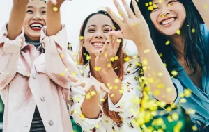 Woman throwing confetti